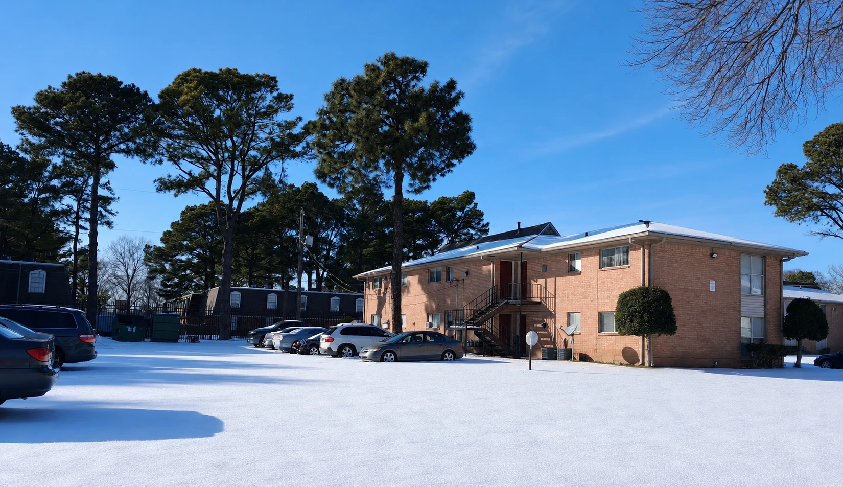 Pine Land Apartments covered in snow